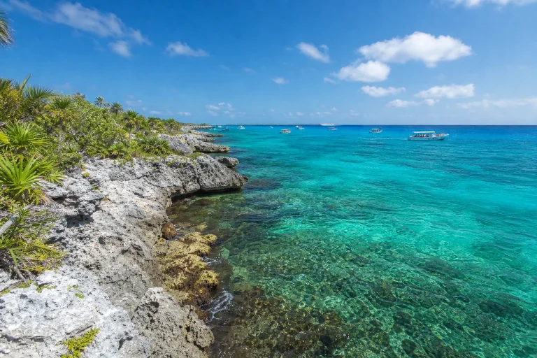 Turquoise Caribbean water and tropical coastline in Cozumel