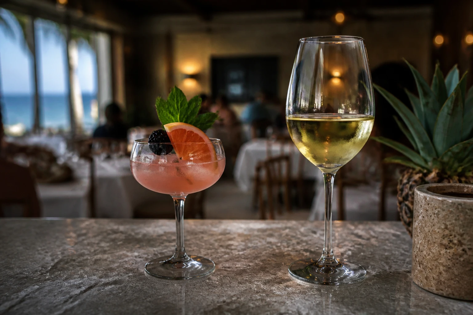 Cocktail and wine served at a Cozumel restaurant bar
